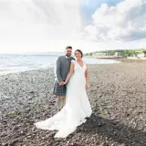 married couple on largs beach in ayrshire